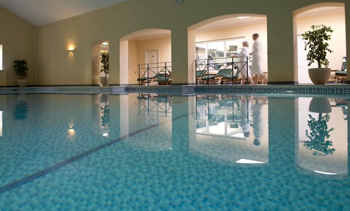 50ft Pool with pool side lounge chairs